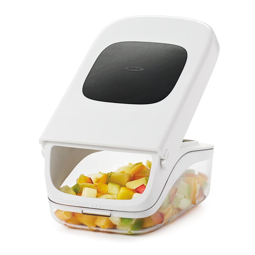 Vegetable chopper with easy pour opening-10